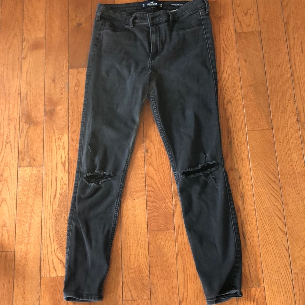 Black high rise distressed black skinny jeans